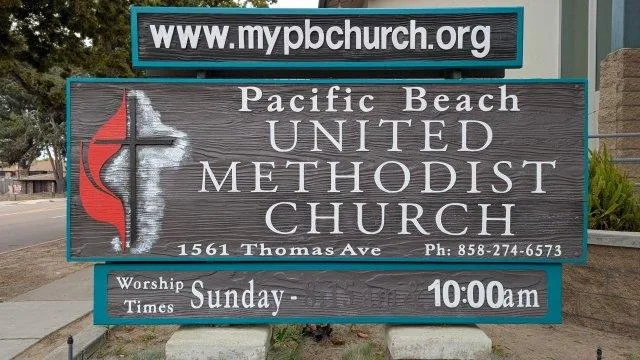 Church sign showing address and service time